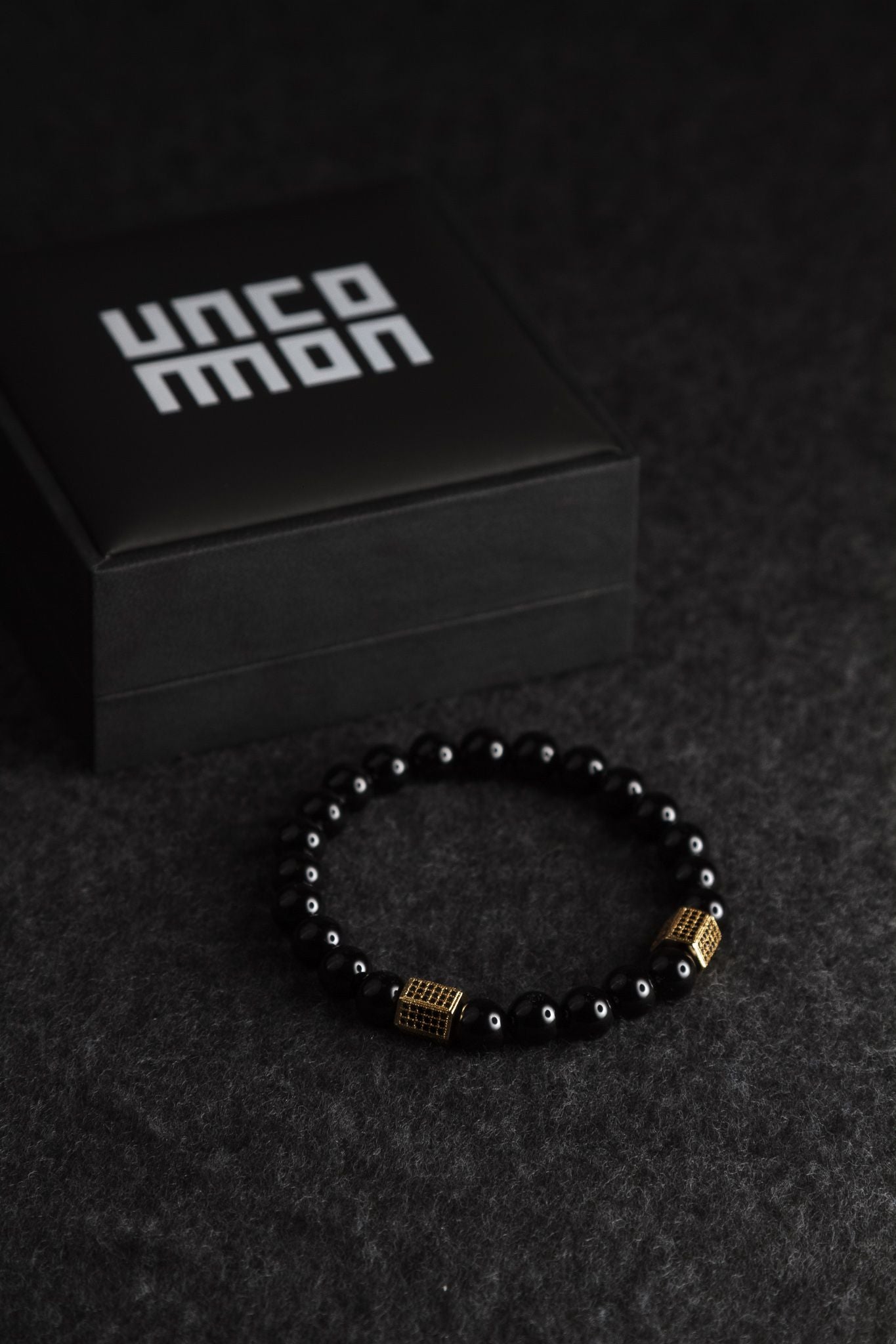 UNCOMMON Men's Beads Bracelet Two Gold Jeweled Chest Charm Black Gloss Onyx Beads