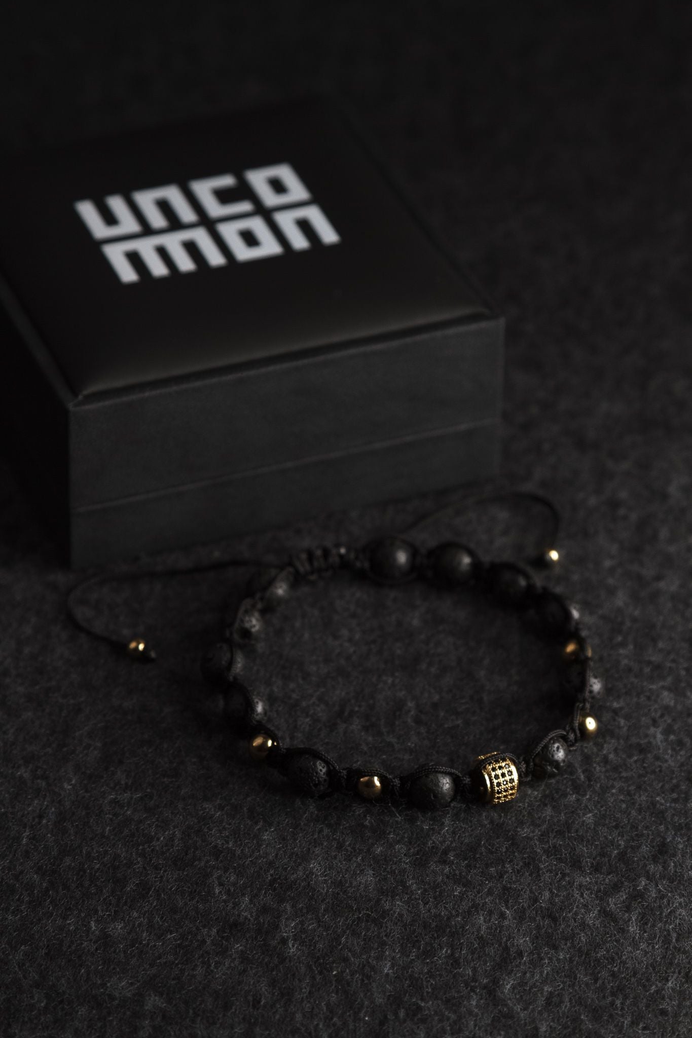 UNCOMMON Men's Beads Bracelet One Gold Jeweled Ring Charm Black Lava B