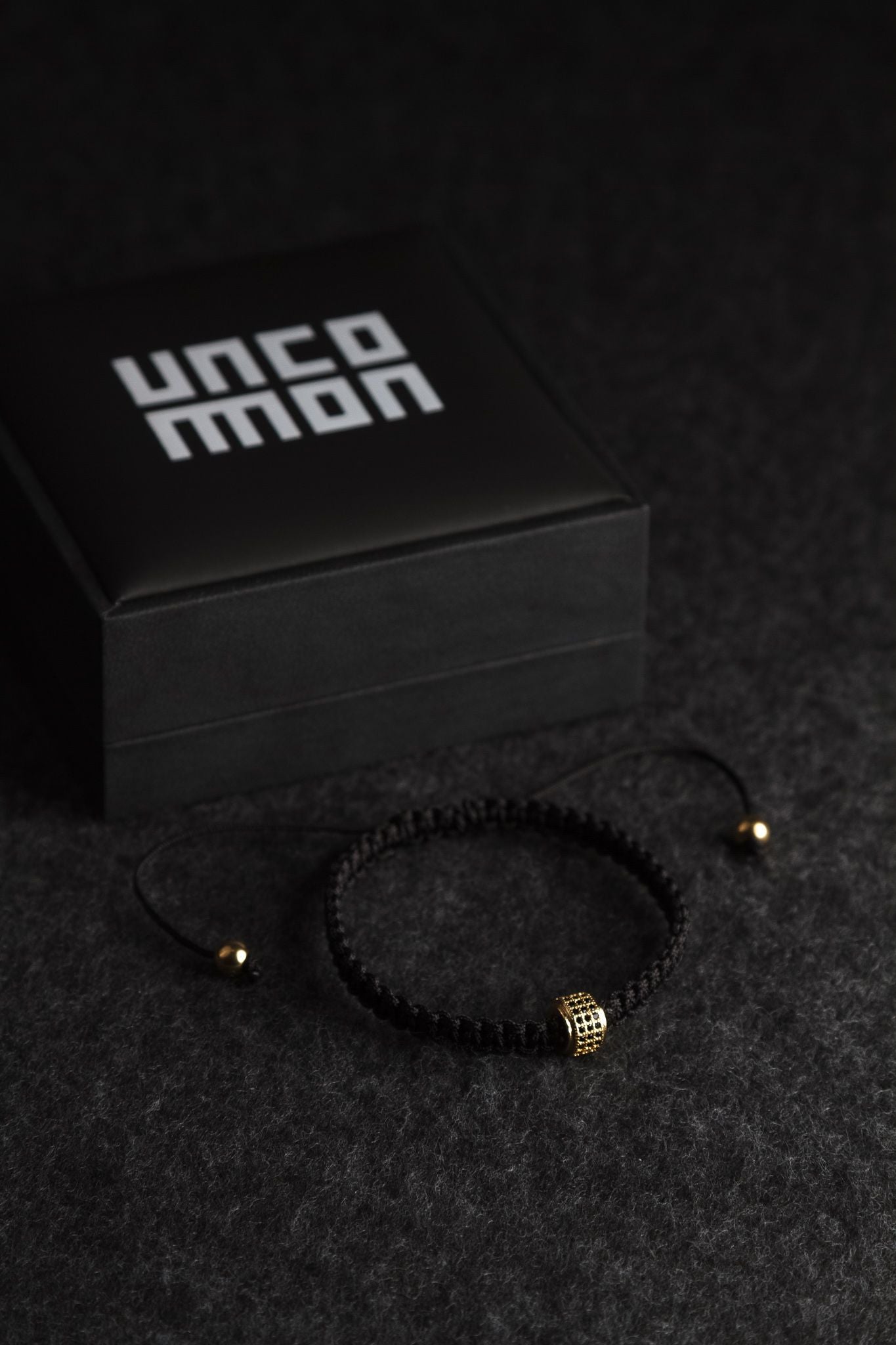 UNCOMMON Men's Woven Bracelet with Single Gold Charm and Accent Beads