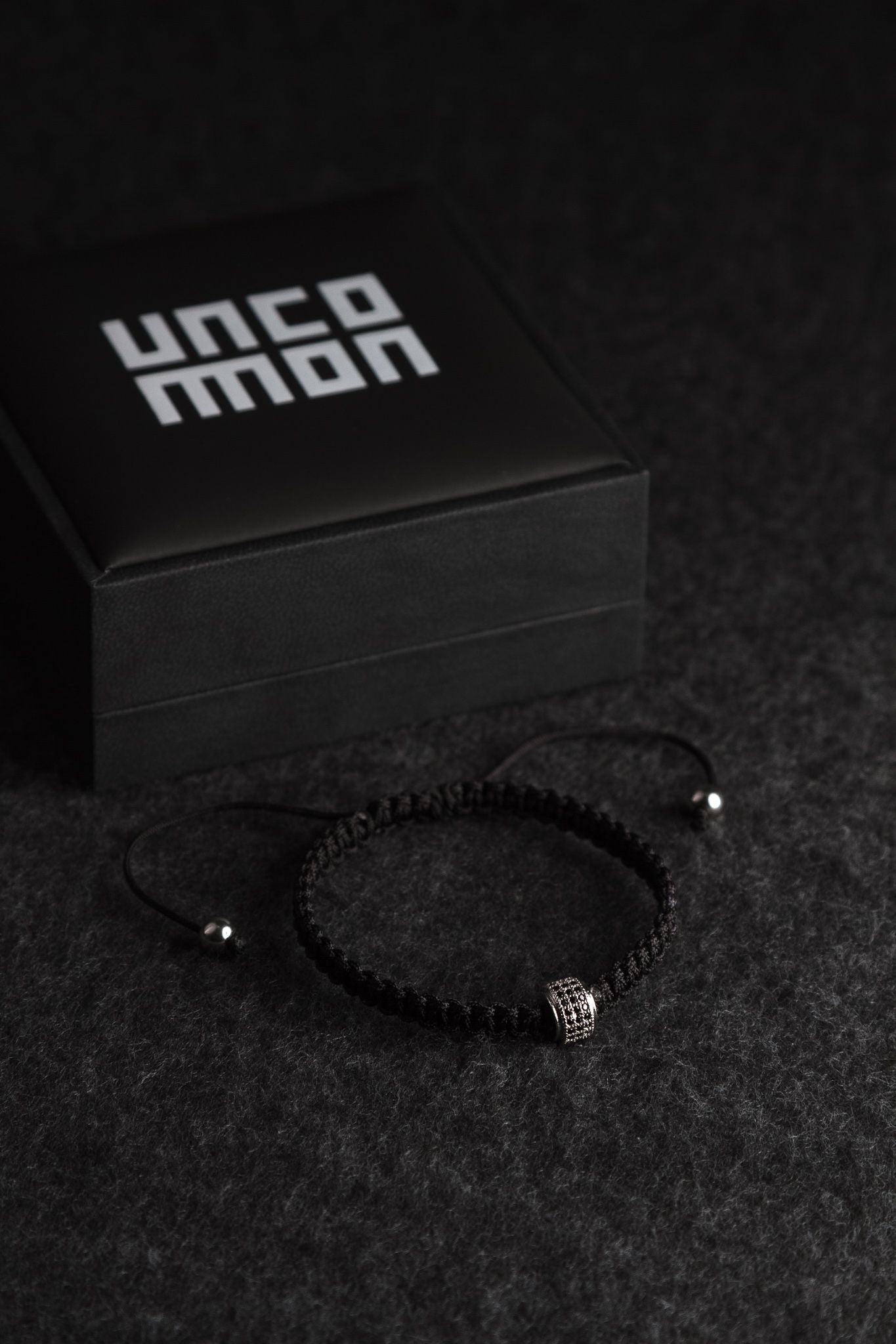 UNCOMMON Men's Woven Bracelet with Single Silver Charm and Accent Beads