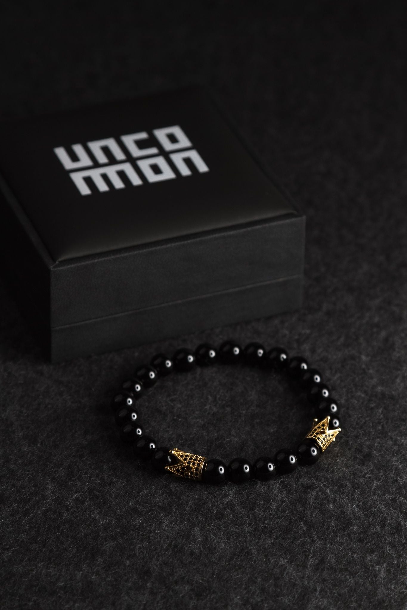 UNCOMMON Men's Beads Bracelet Two Gold Crown Charms Black Onyx Beads